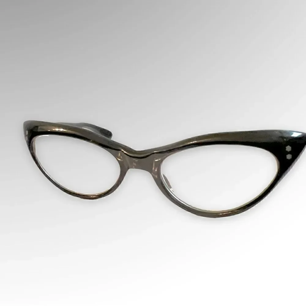 Vintage cat frame glasses by France Swank. Mint condition.